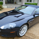 Illustration for article titled Why Buy A Used M3 When You Can Get A Sexy V12 Aston Martin Convertible?